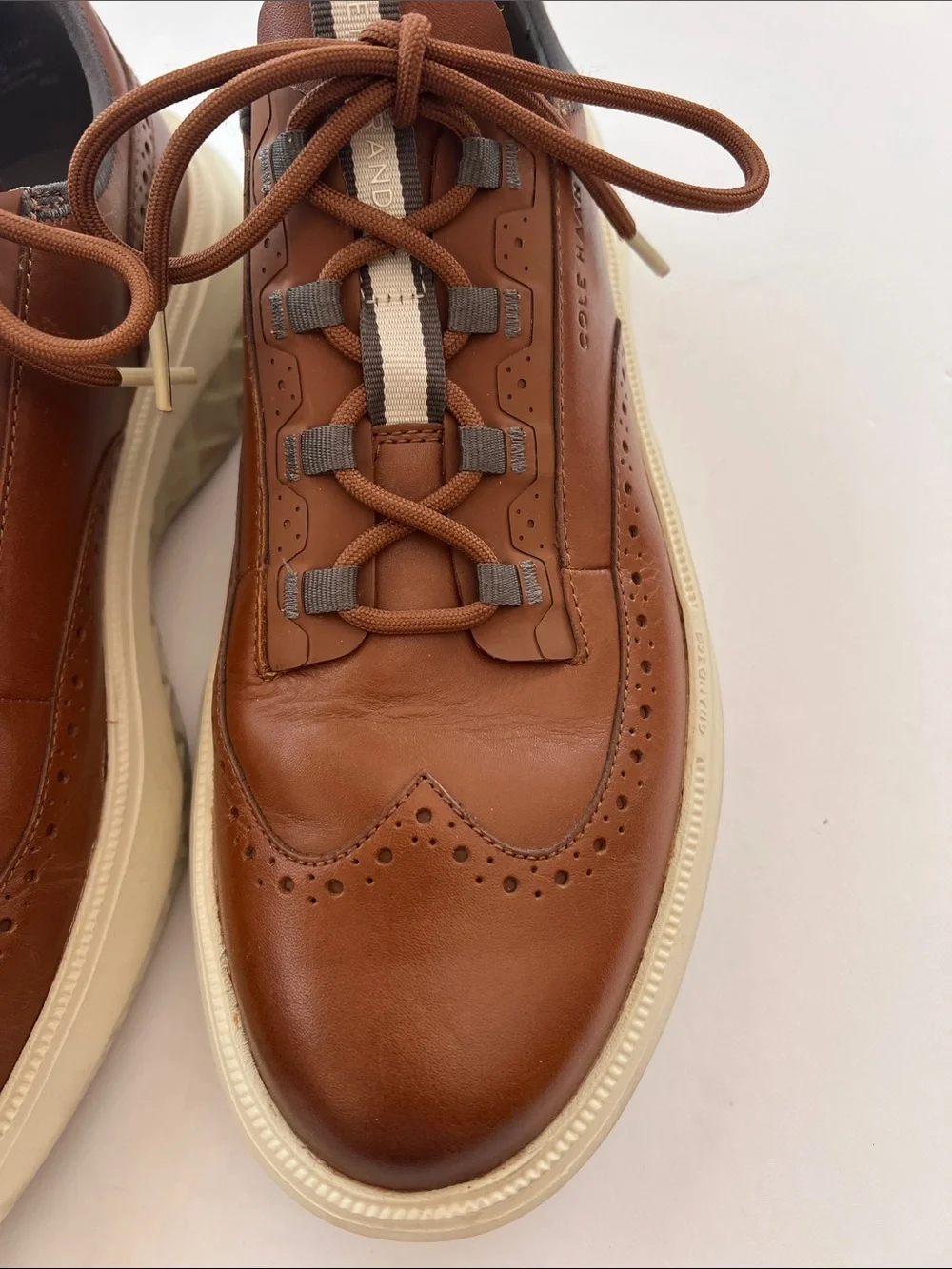 Cole Haan ZERØGRAND British Tan Leather Wingtip Sneaker with Cream Sole